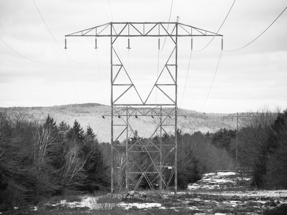 Layers of electrical transmission towers