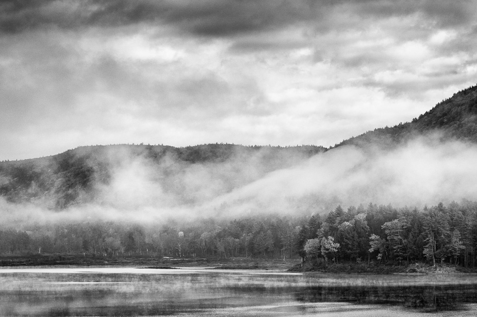 Fog lifting from the hills surrounding Surry Mountain Dam
