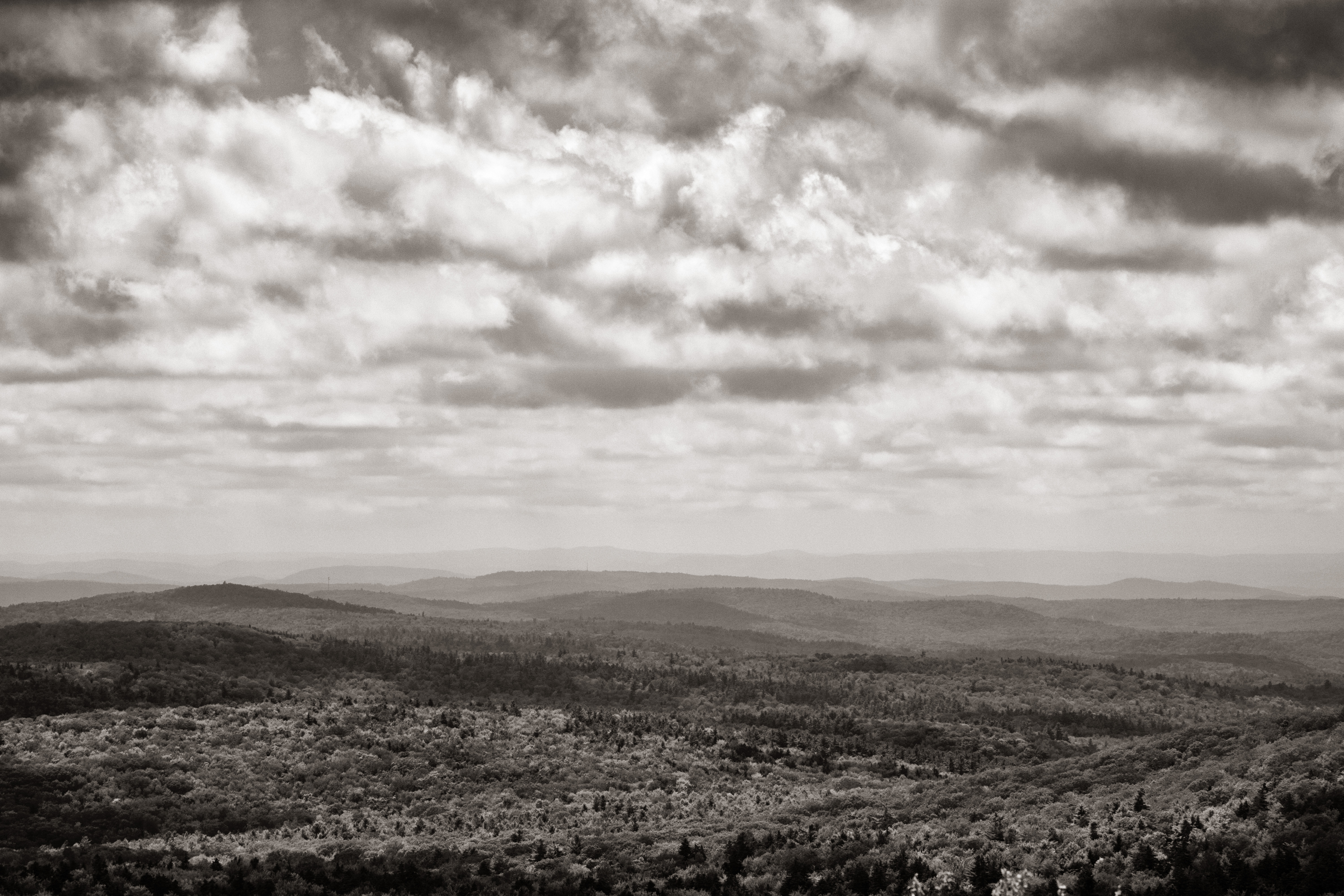 Clouds and rolling hills as seen from the summit of Pitcher Mountain