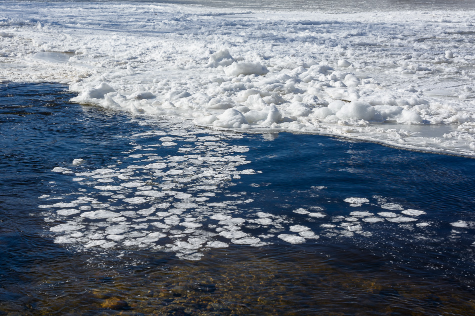 Photo of ice advancing toward the Ashuelot River Dam in Keene, NH