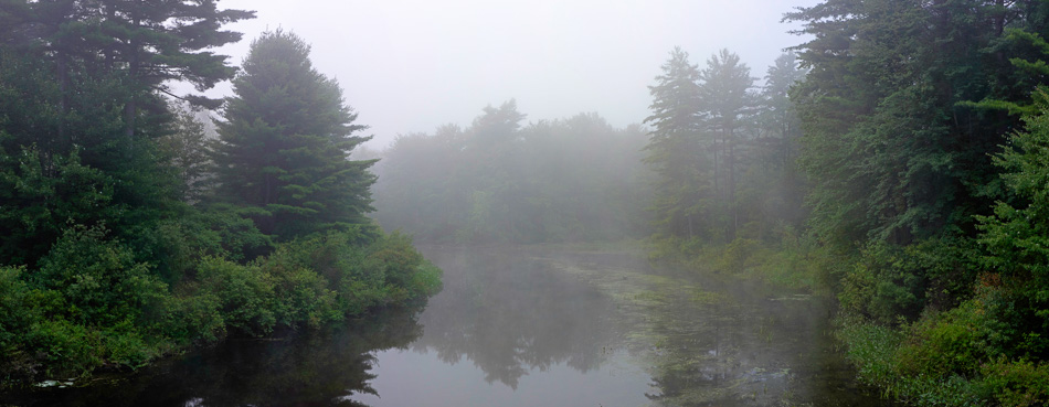 Color panoramic photo of a foggy Ashuelot River in Keene, NH