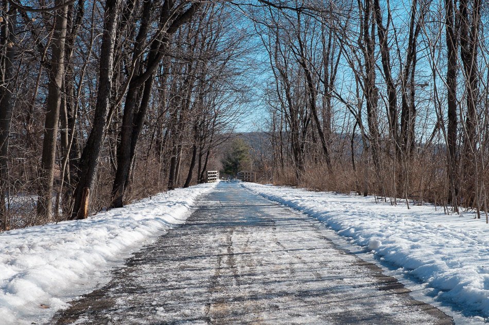 Color photo of an icy bike path off Pearl Street in Keene, NH