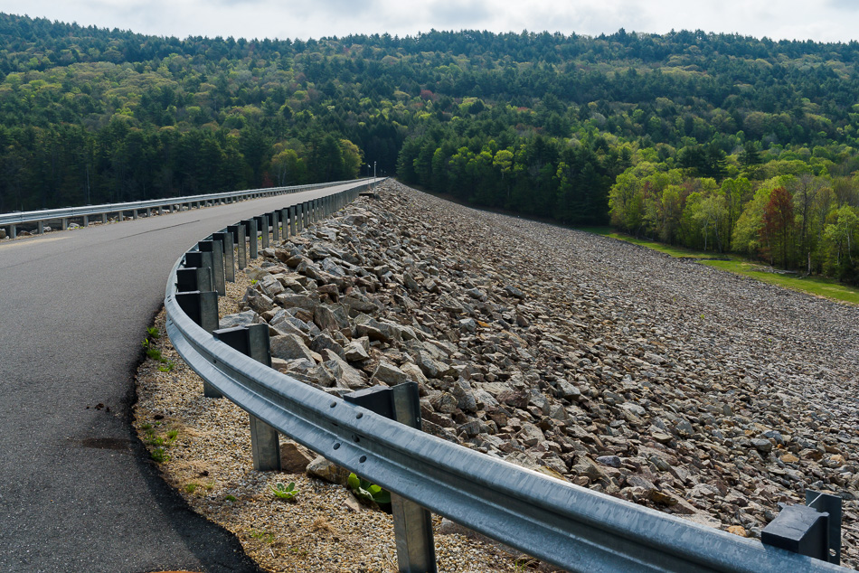 Color photo of the guardrail running along the top of Surry Dam