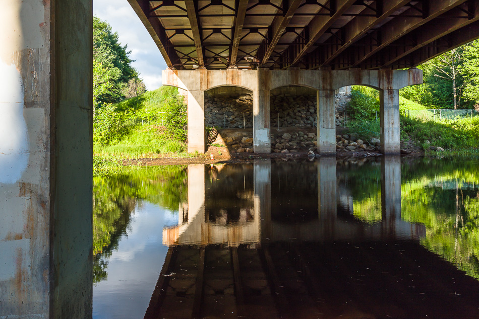 Color photo taken beneath the Route 9 bridge over the Ashuelot River in Keene, NH