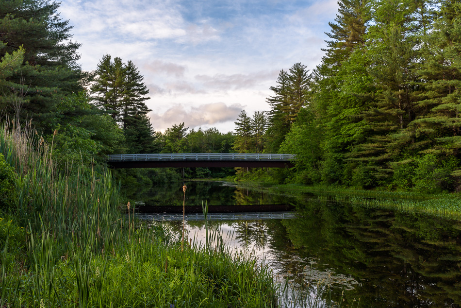 Color photo looking South towards the North footbridge over the Ashuelot River in Keene, NH